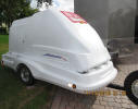 For Sale: Clam shell type trailer. Easy to tow. Weighs 760 lbs. Fits in your garage. Will email spec sheet. 
